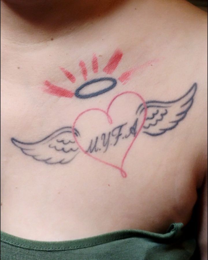 Heart with wings American traditional tattoo on the chest by Alfredo Sosa