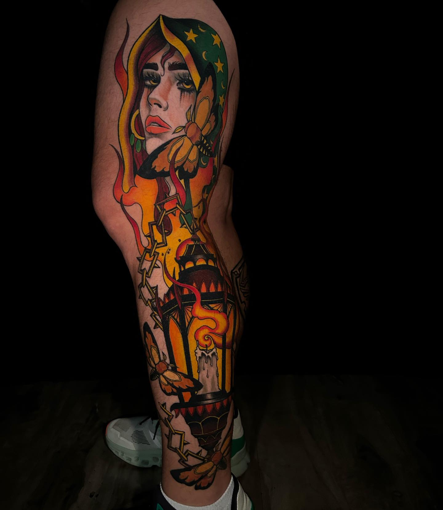 Woman with flower American traditional tattoo on the leg by Lexi Kniskern