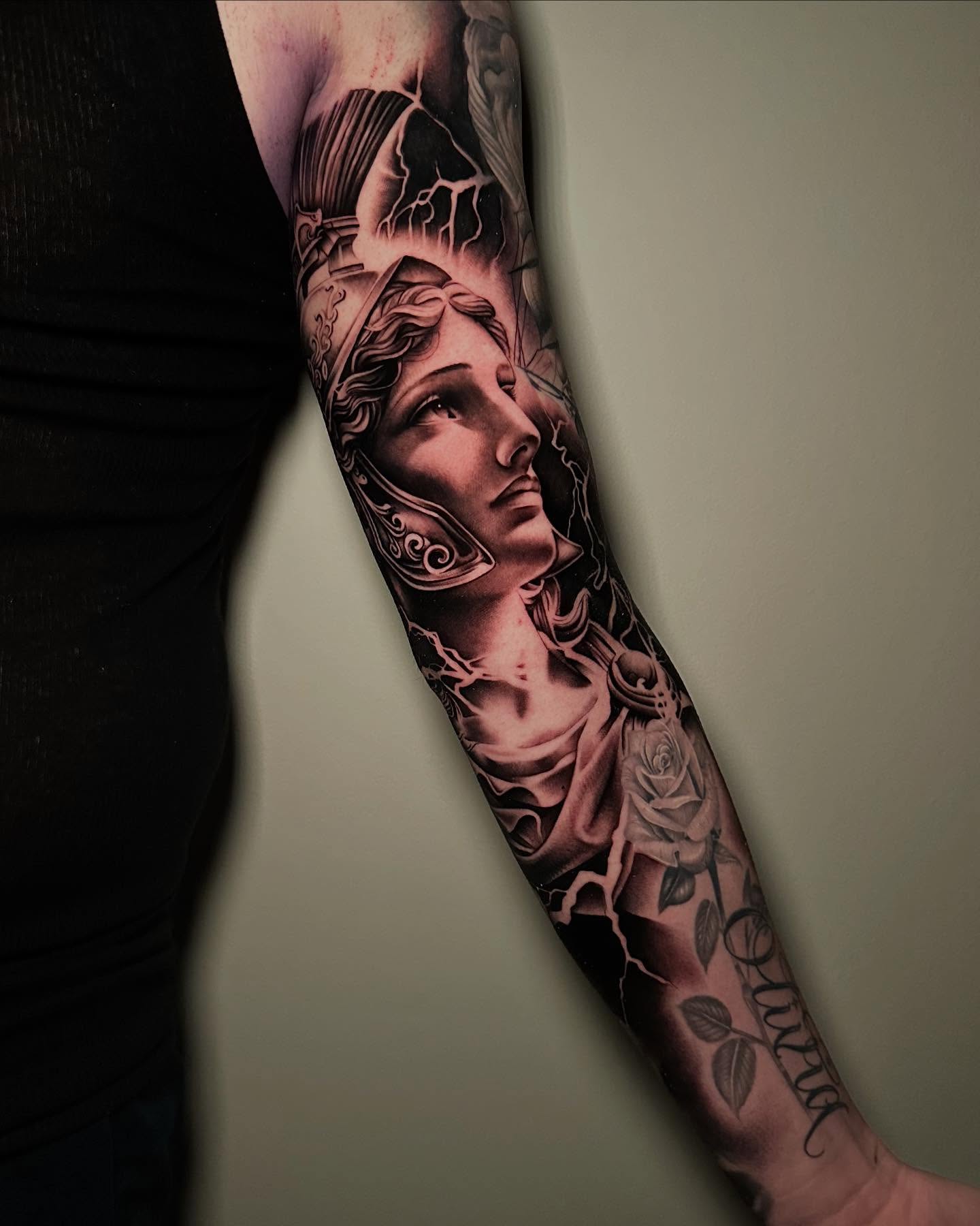 Woman's head realism tattoo on the forearm by Miguel Saucedo