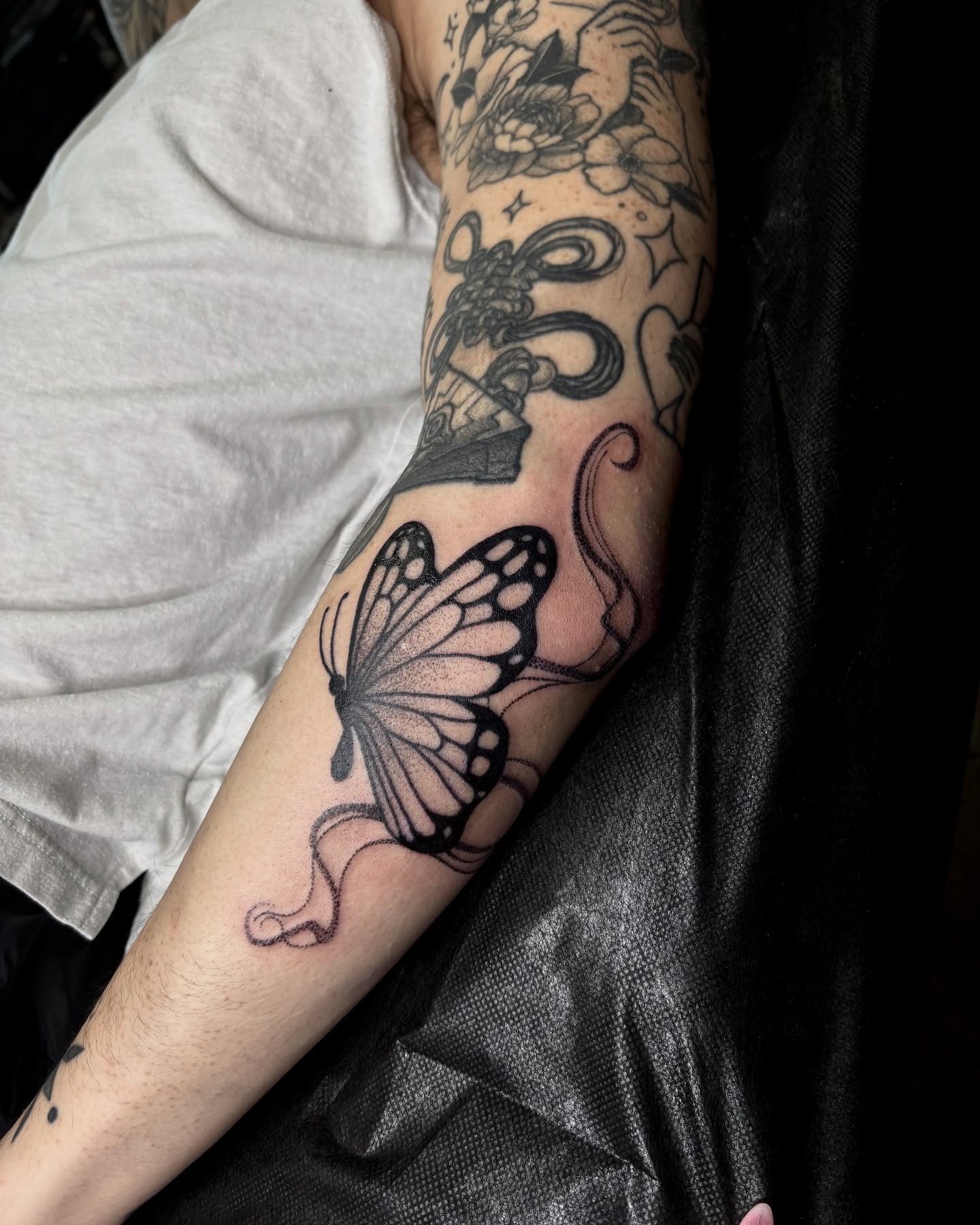 Butterfly dotwork tattoo on the forearm by Kolbi Alexis