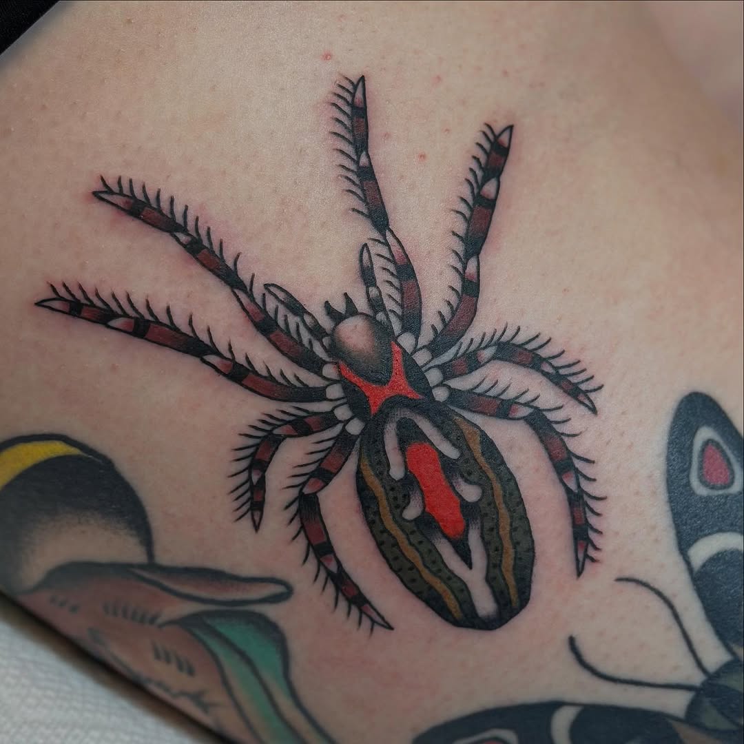 Spider blackwork tattoo on the upper arm by @ryleecoyote, New York, New York