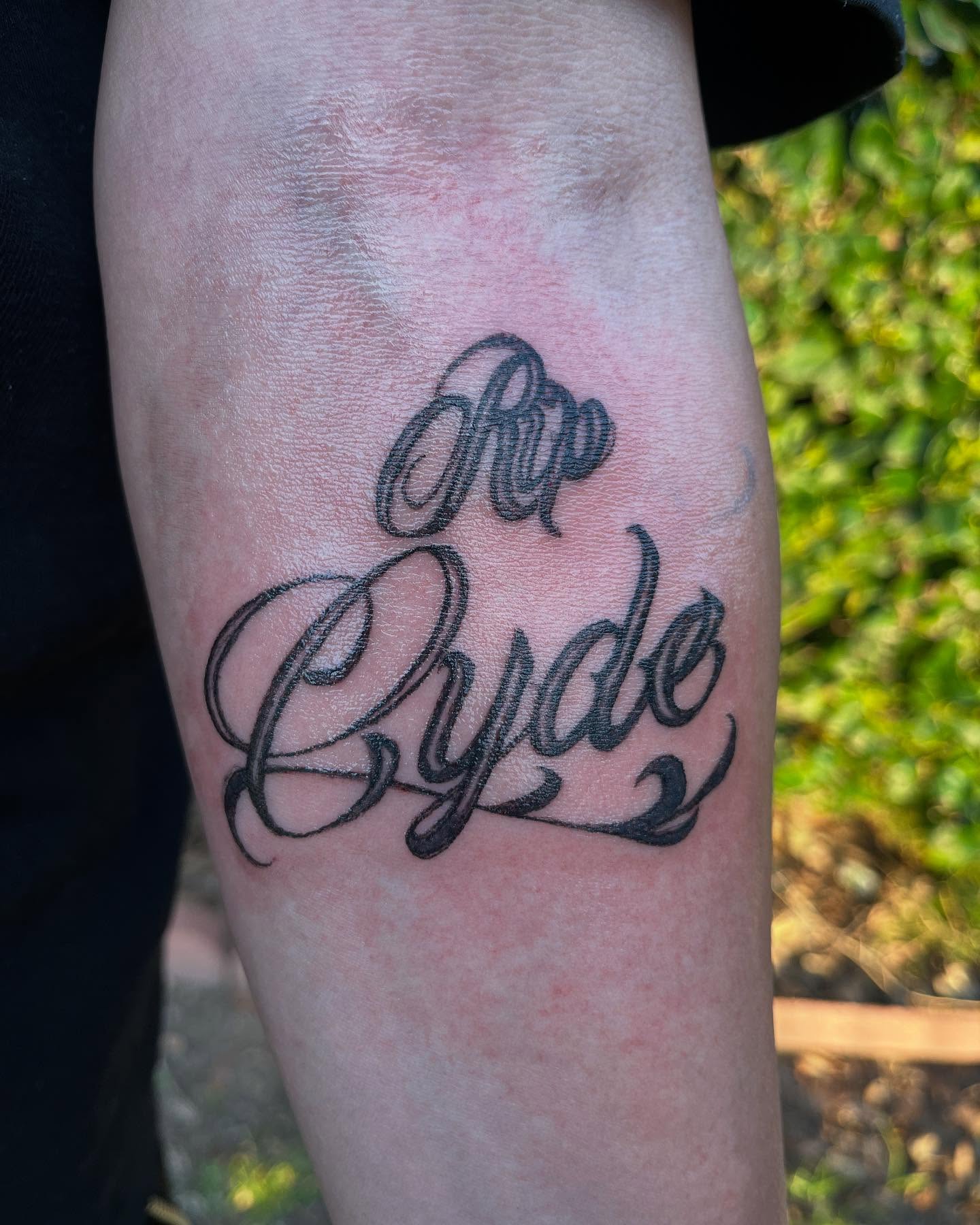 Ryde lettering script tattoo on the forearm by Ink_ Hustle36