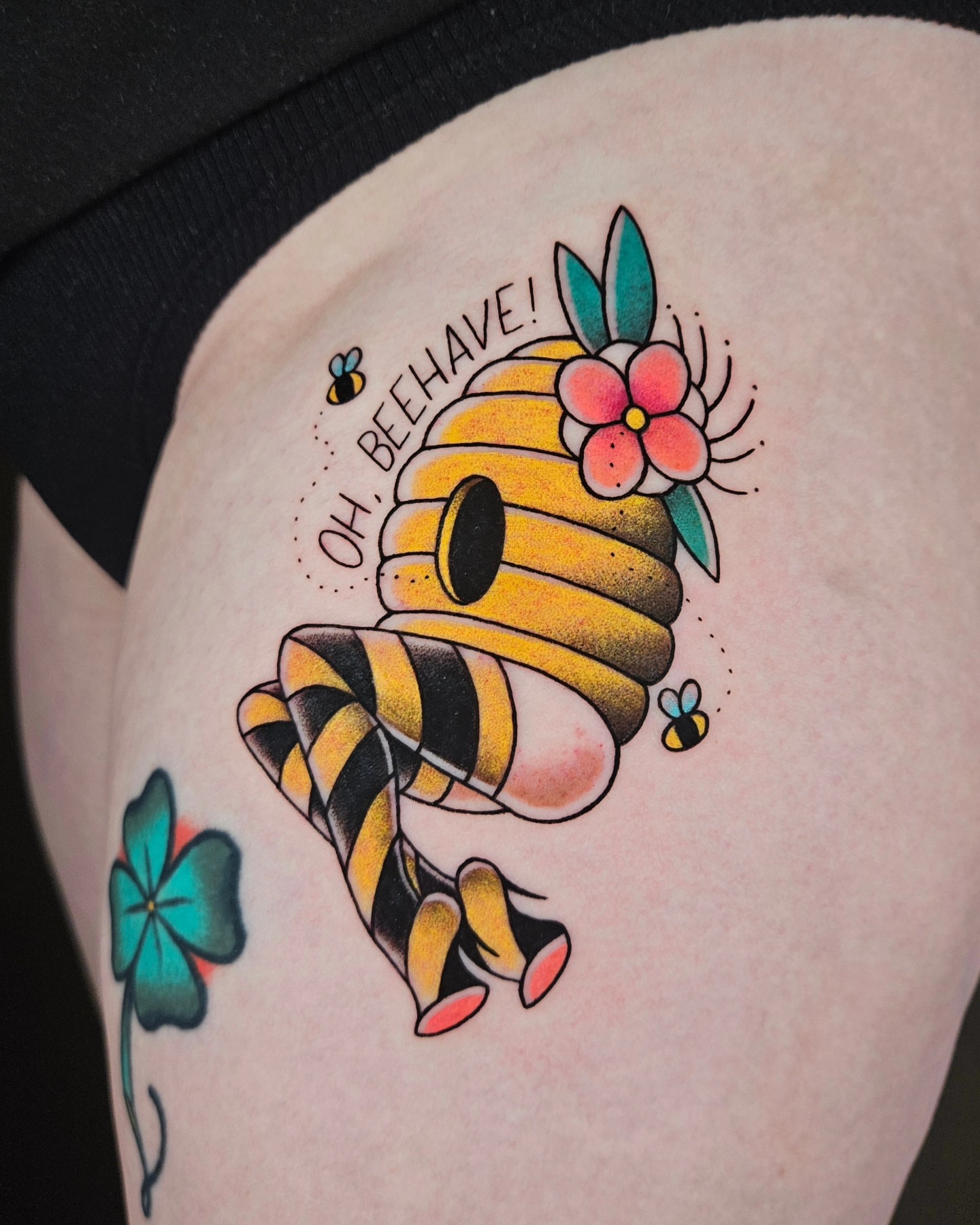 Bee hive and flowers American traditional tattoo on the thigh by Chloe🌿Tattoos