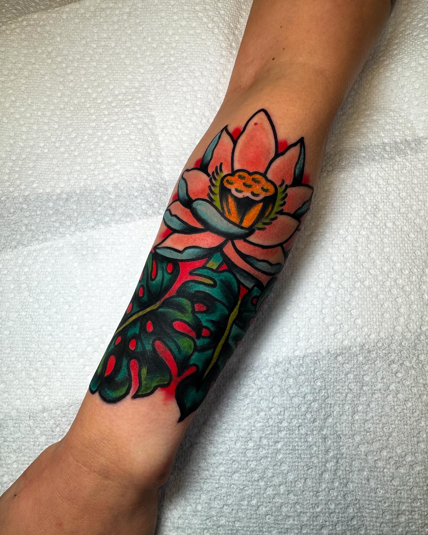 Lotus flower American traditional tattoo on the forearm by Alex Kass 🥩 San Antonio TX, San Antonio, Texas