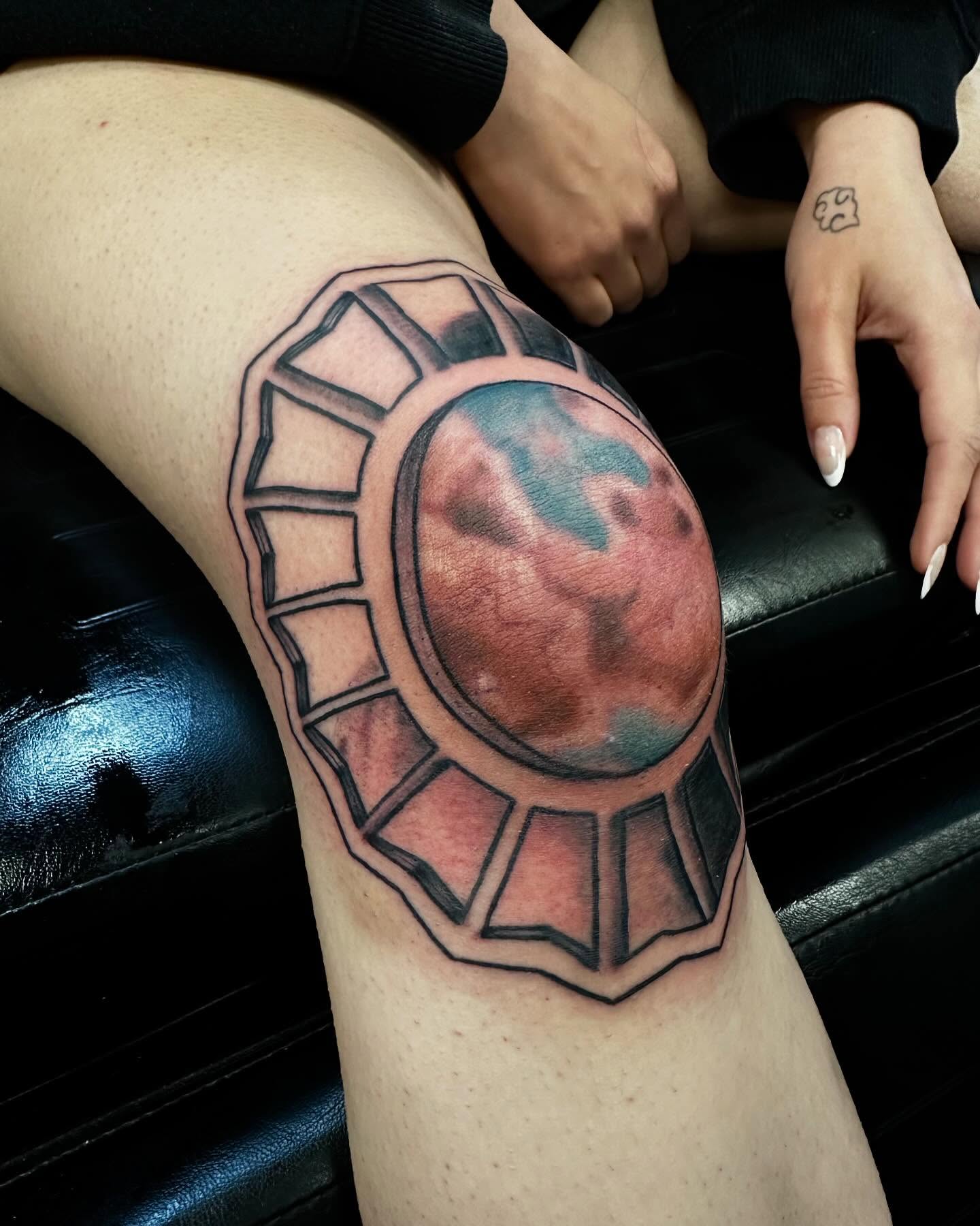 Moon and geometric frame realism tattoo on the thigh by Jay Morales