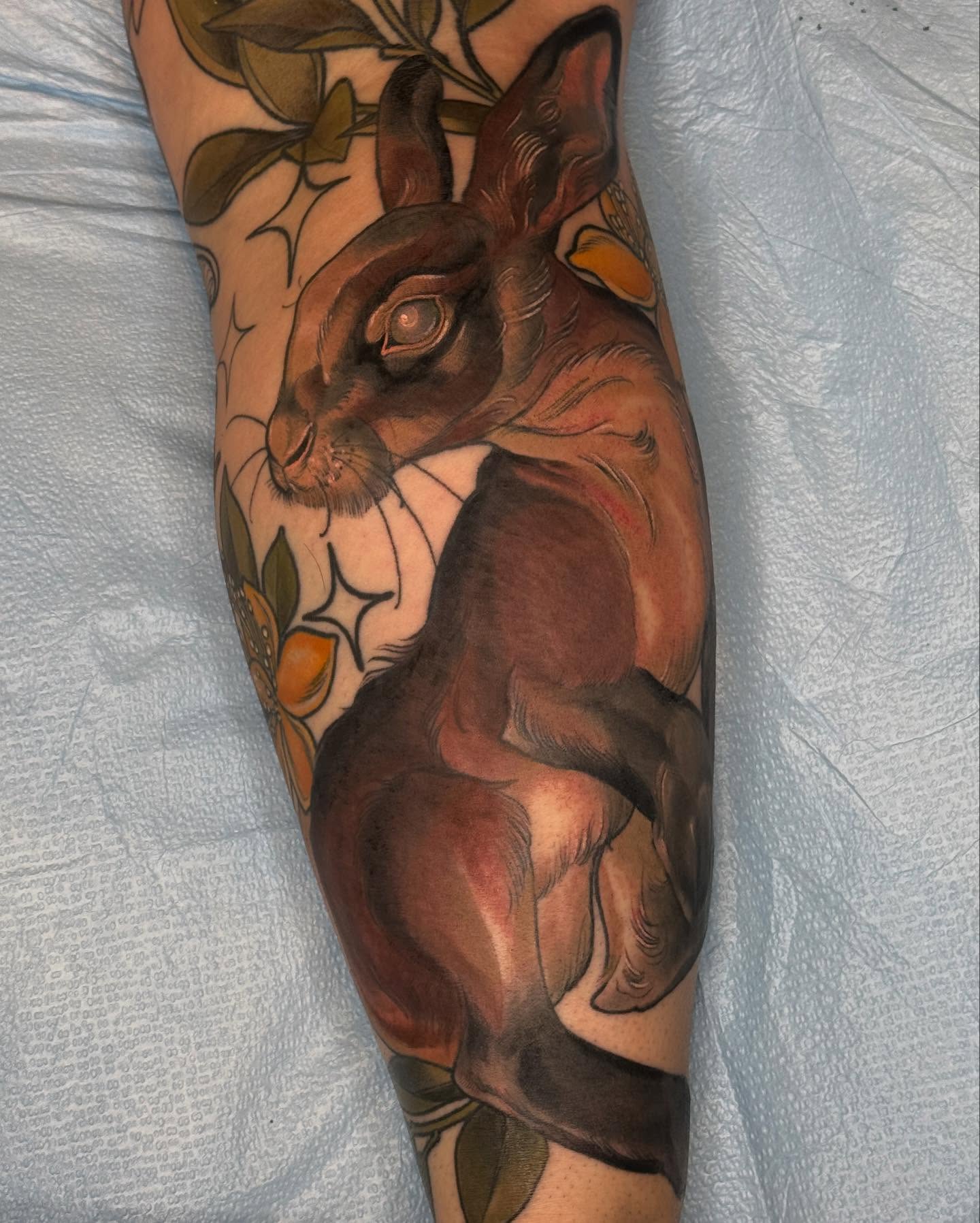 Rabbit realism tattoo on the forearm by Rachael Shelly