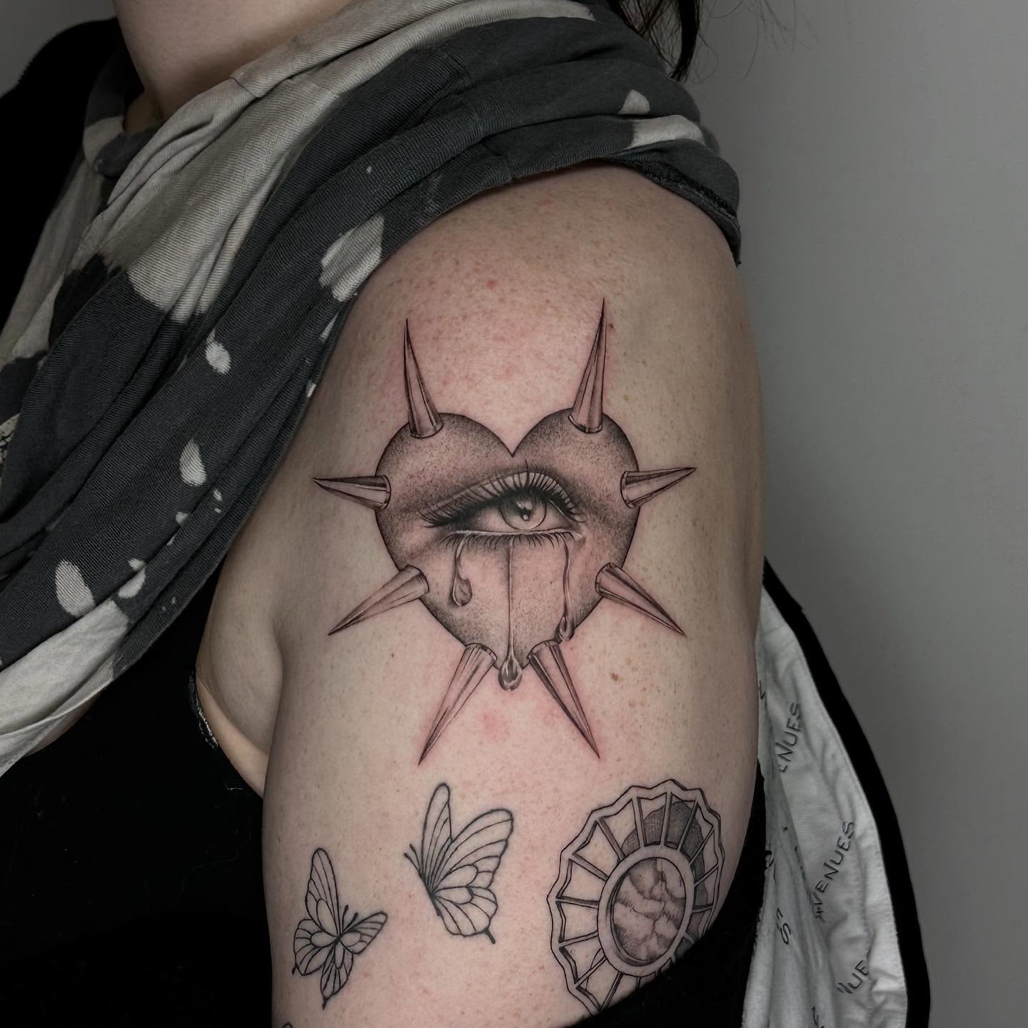 Eye with thorns realism tattoo on the shoulder by ๐๐๐๐ ๐๐๐๐