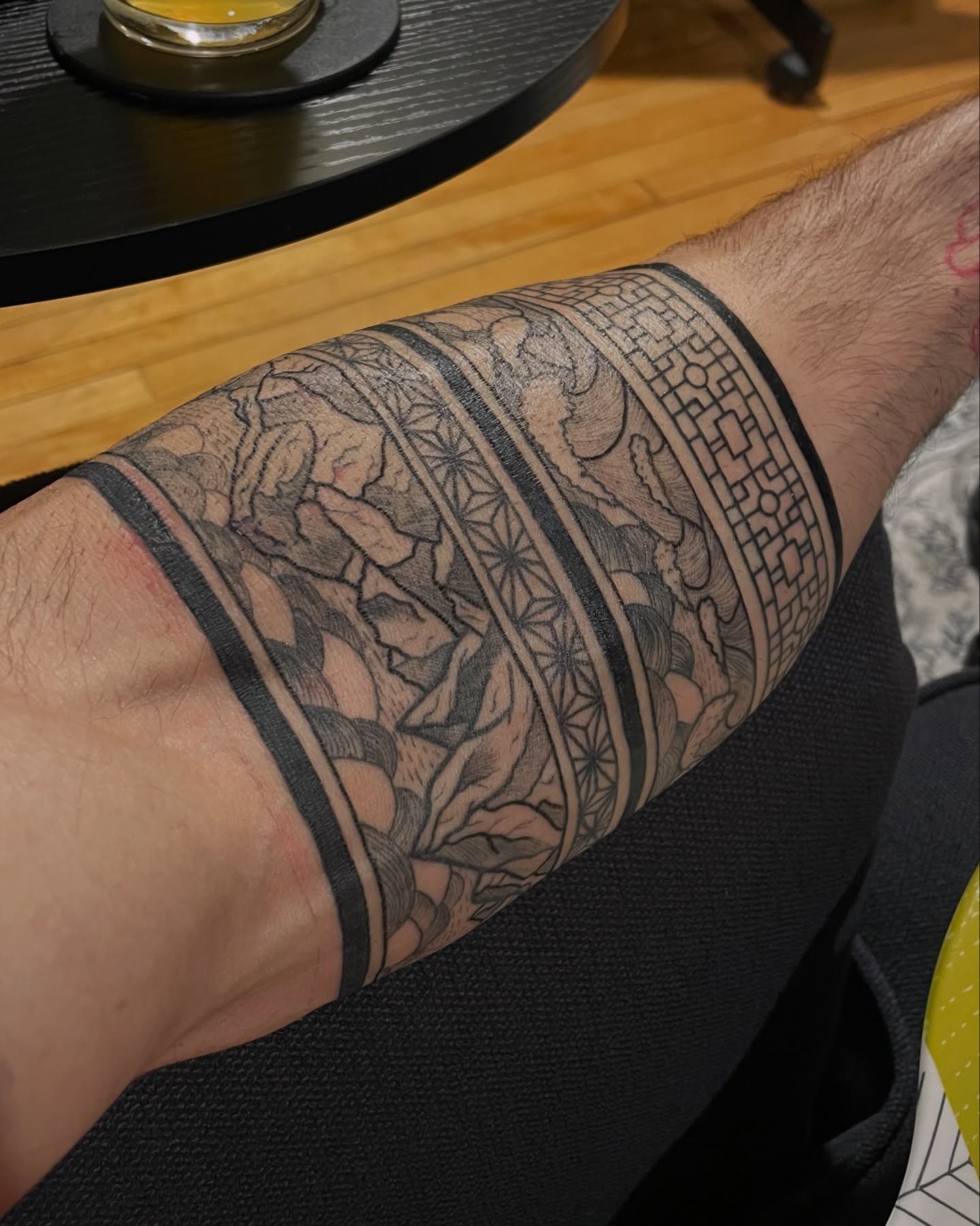 Mountain landscape geometric tattoo on the forearm by Piccolino, Cambridge, Massachusetts