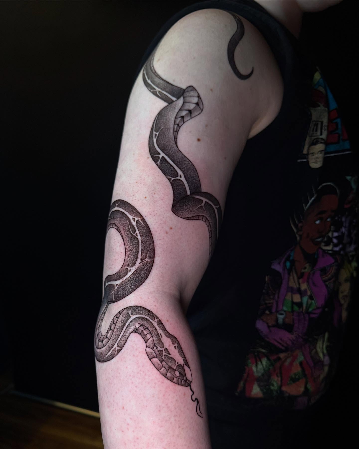 Snake black and grey tattoo on the forearm by Dylan Orbock, Berkeley, California