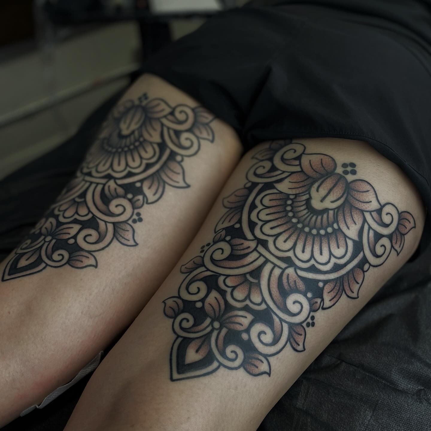 Floral mandala ornamental tattoo on the thigh by Veronica