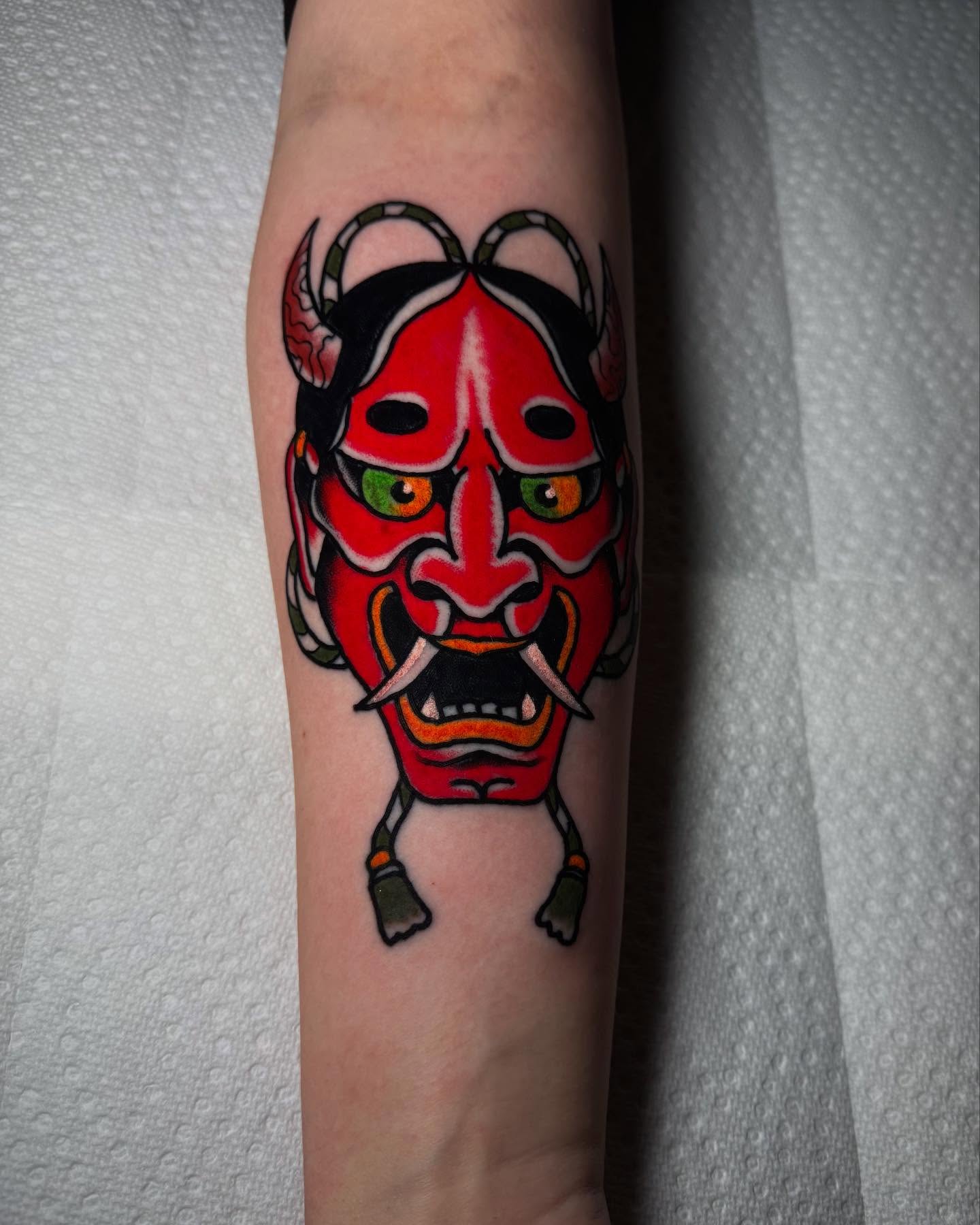 Demon mask japanese irezumi tattoo on the forearm by Noah Diffenderfer, Phoenix, Arizona