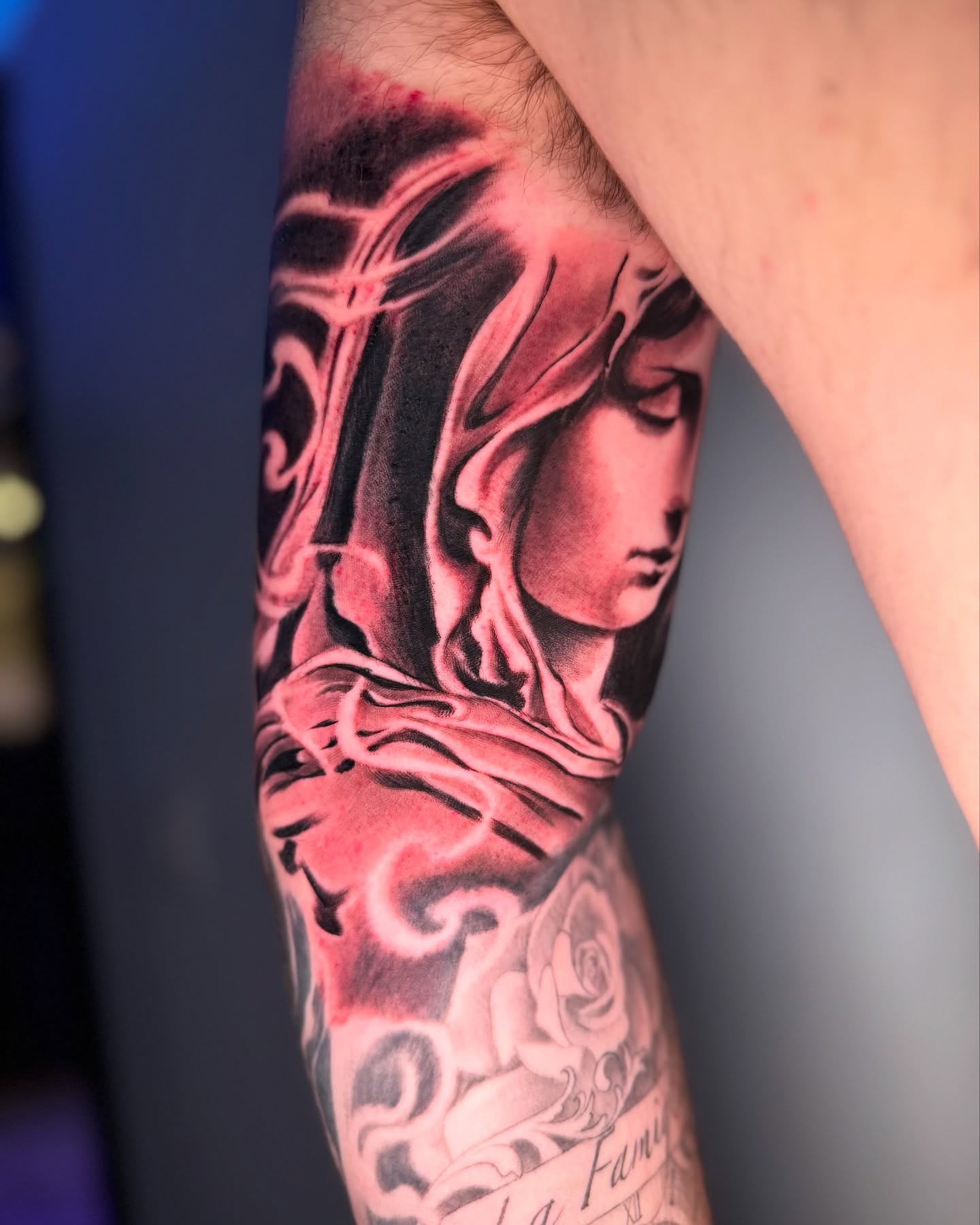 Woman's head realism tattoo on the forearm by elvis flores