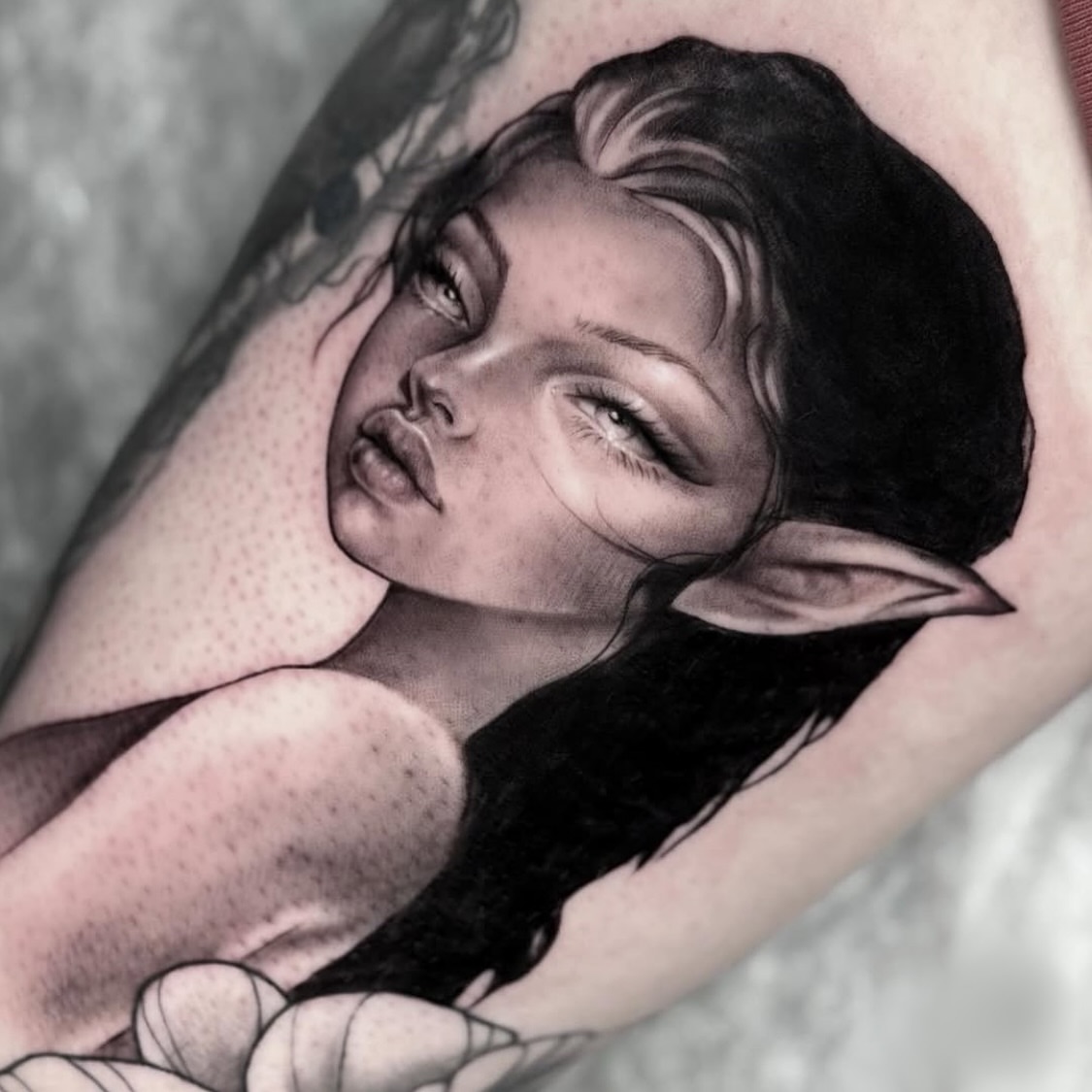 Tattoo by @eyepokes — realism, black_and_grey