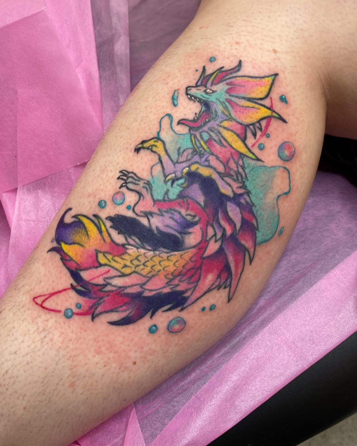 Dragon watercolor tattoo on the forearm by @kaitlin.tattoos, Richmond, Virginia