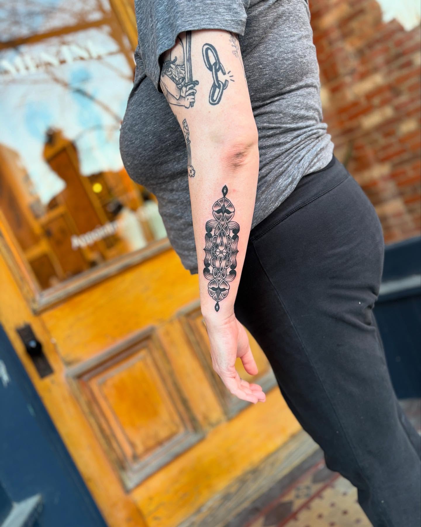 Geometric pattern geometric tattoo on the forearm by kris noble floyd