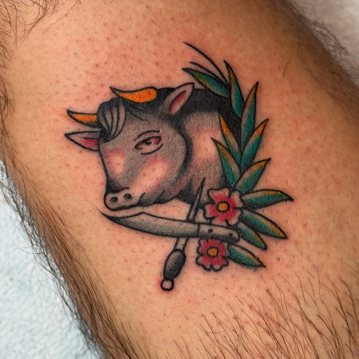 Bull and dagger American traditional tattoo on the shoulder by Dave Shurman