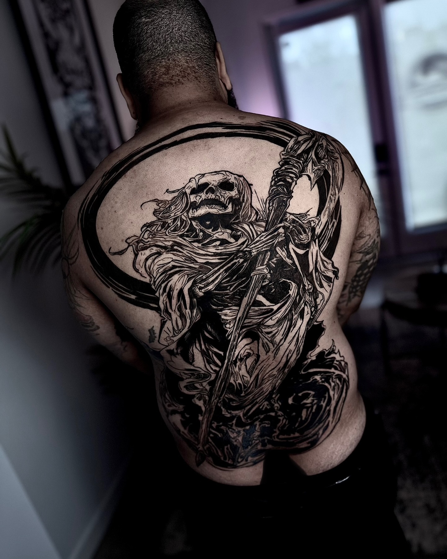 Reaper black and grey tattoo on the back by Bwk Dark Art