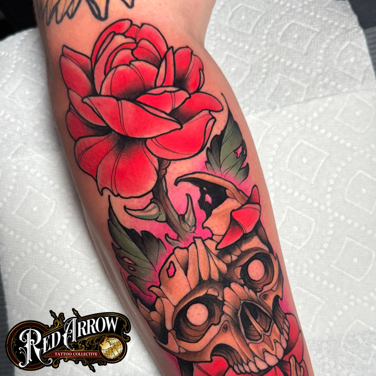 Red rose and skull American traditional tattoo on the forearm by 𝕽𝖊𝖉 𝕬𝖗𝖗𝖔𝖜 𝕿𝖆𝖙𝖙𝖔𝖔 𝕮𝖔𝖑𝖑𝖊𝖈𝖙𝖎𝖛𝖊, Troy, Michigan