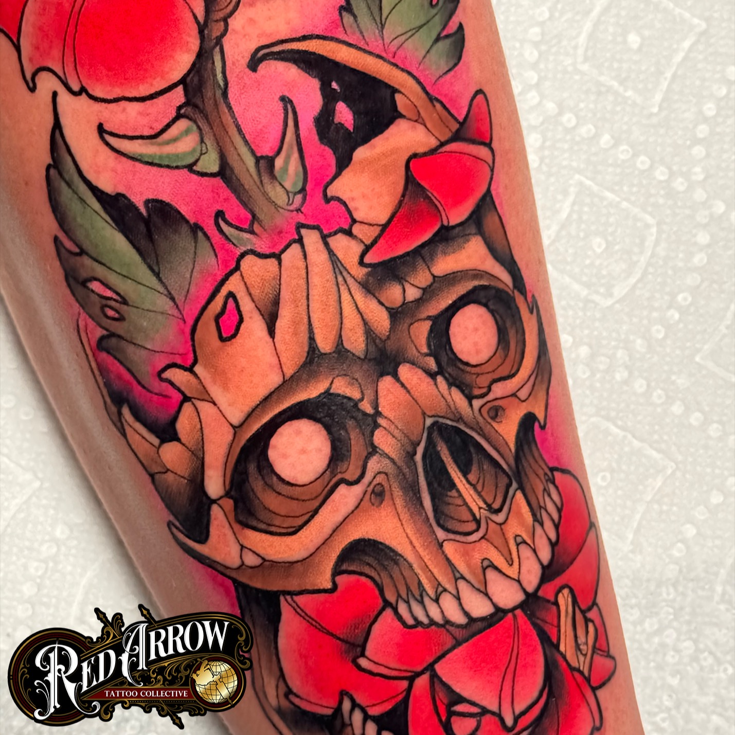 Skull and roses American traditional tattoo on the forearm by 𝕽𝖊𝖉 𝕬𝖗𝖗𝖔𝖜 𝕿𝖆𝖙𝖙𝖔𝖔 𝕮𝖔𝖑𝖑𝖊𝖈𝖙𝖎𝖛𝖊, Troy, Michigan