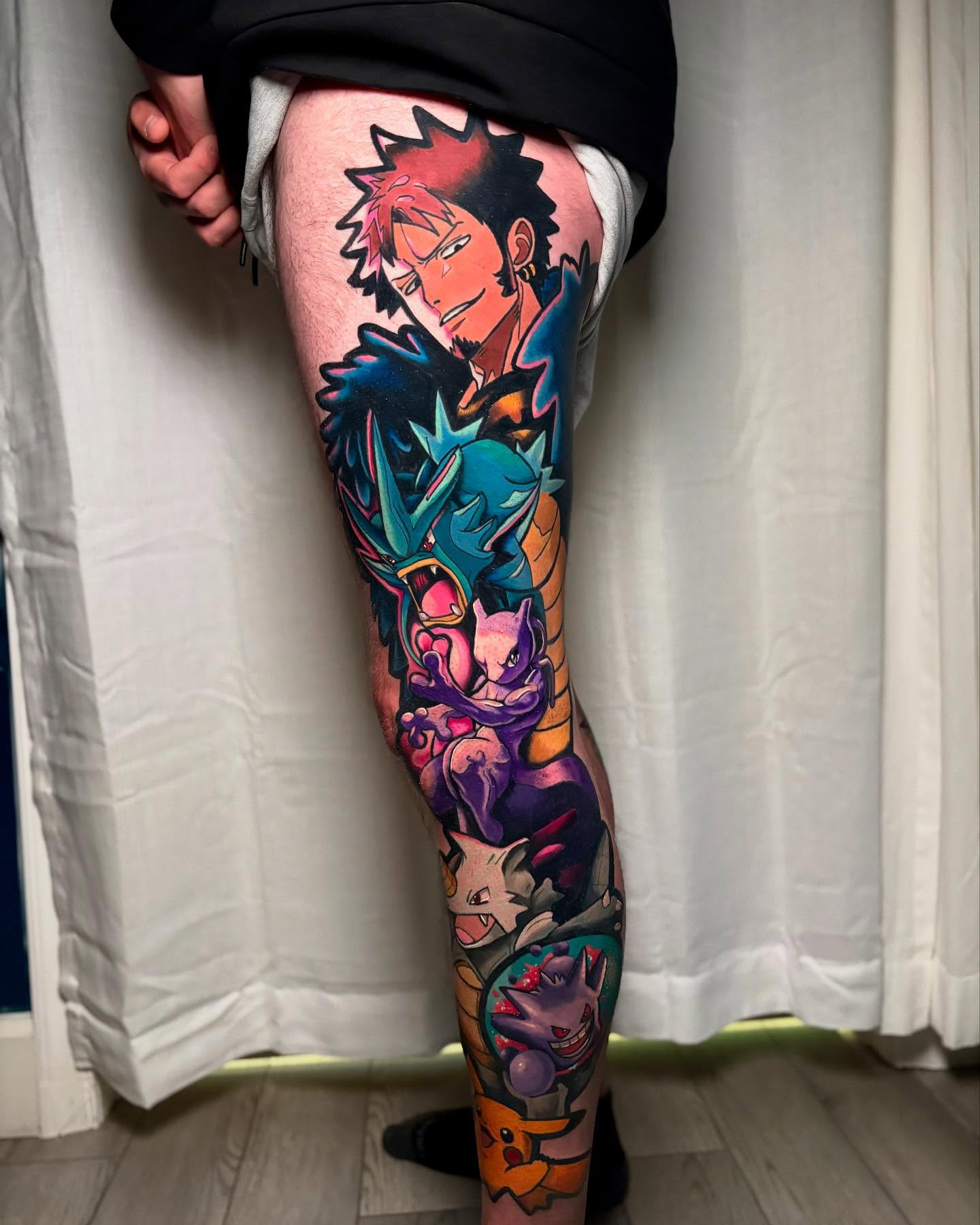 Anime characters anime tattoo on the leg by Jess