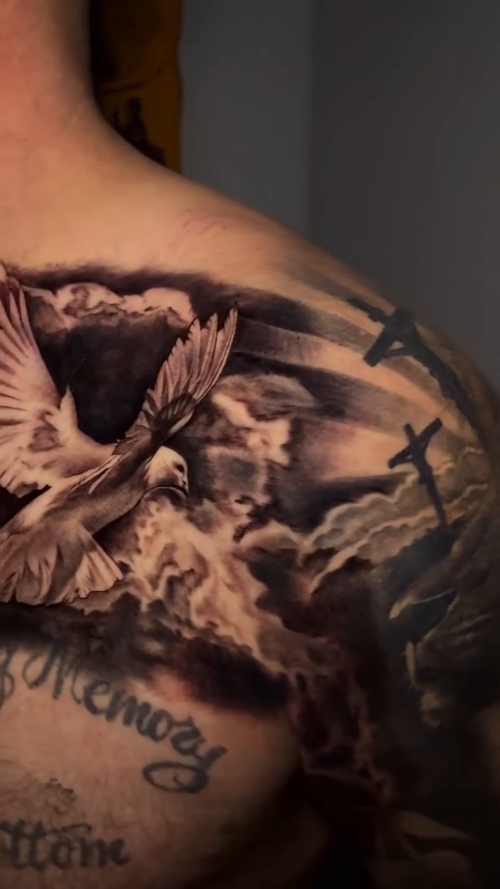 Dove and crosses realism tattoo by Ian Vanderwerff