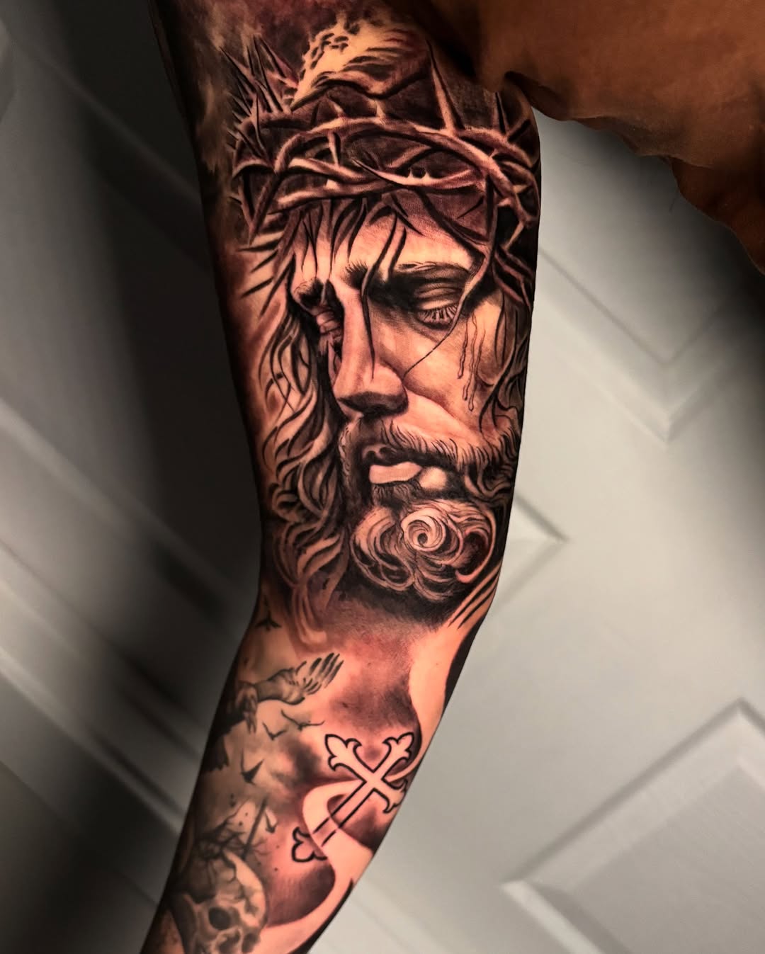 Realism tattoo on the forearm by Eric Garcia