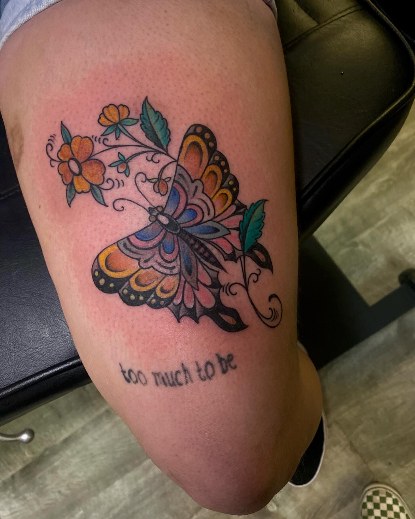 Butterfly and flowers new school tattoo on the thigh by Chase Skylar Clayton Ogle