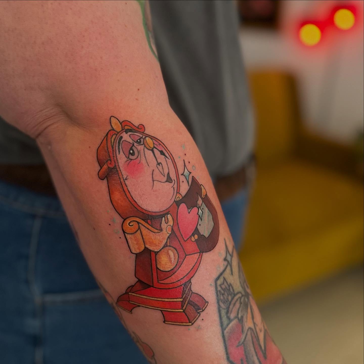 Clock character dotwork tattoo on the forearm by Abigail Townsend