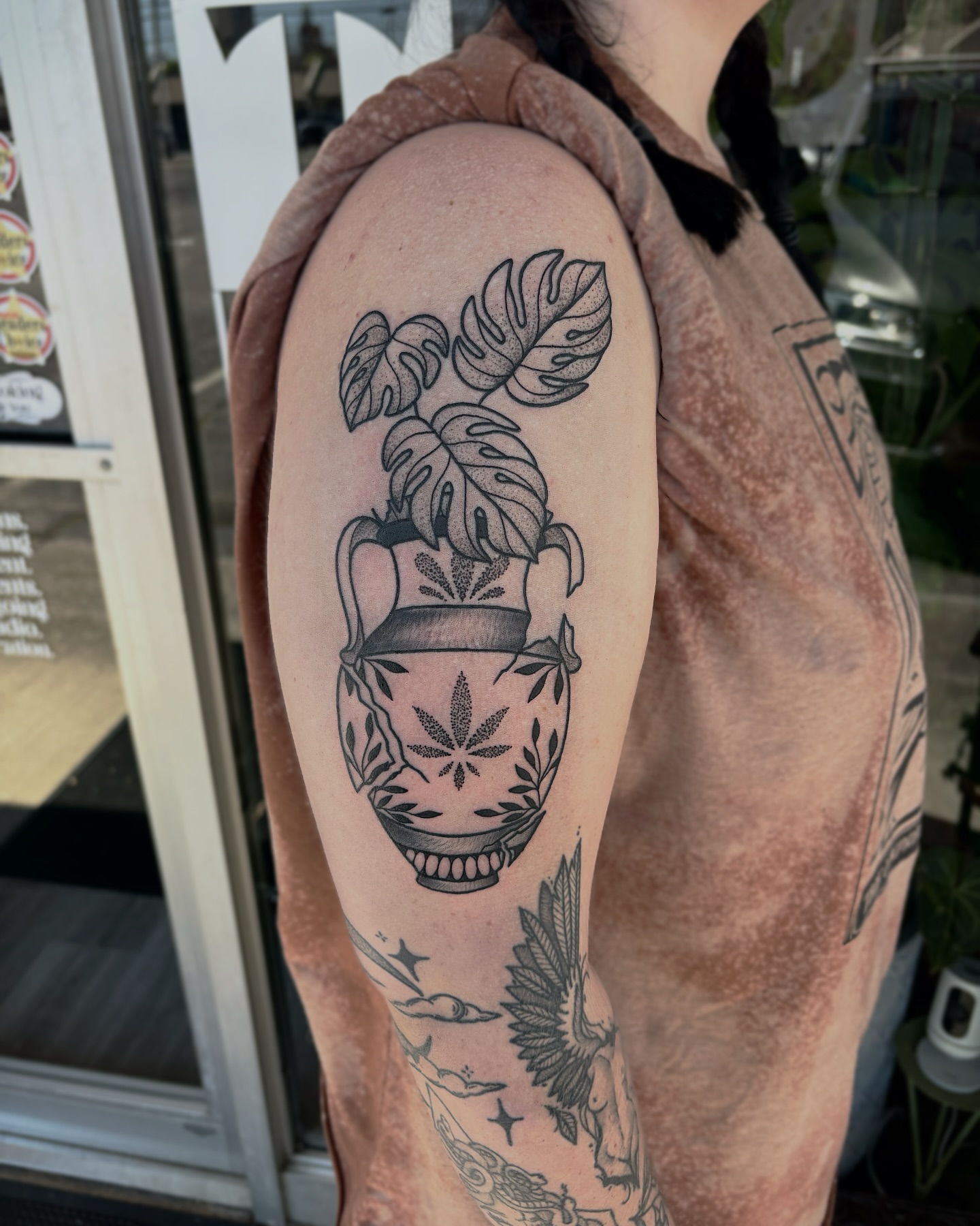 Vase with plant black and grey tattoo on the forearm by Bunny Noel
