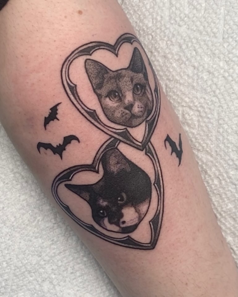 Cats in heart frames dotwork tattoo on the forearm by ππππππ