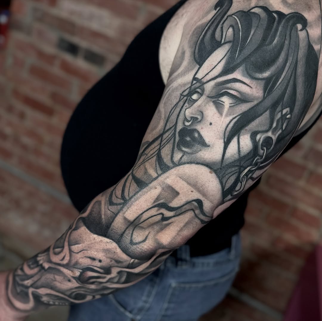 Tattoo by @brookelle.bombshelle — black_and_grey, dark_realism