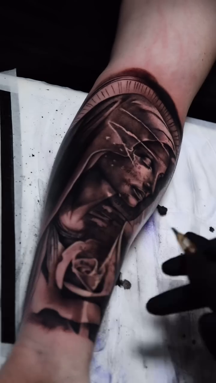 Woman and rose realism tattoo by caleb coley