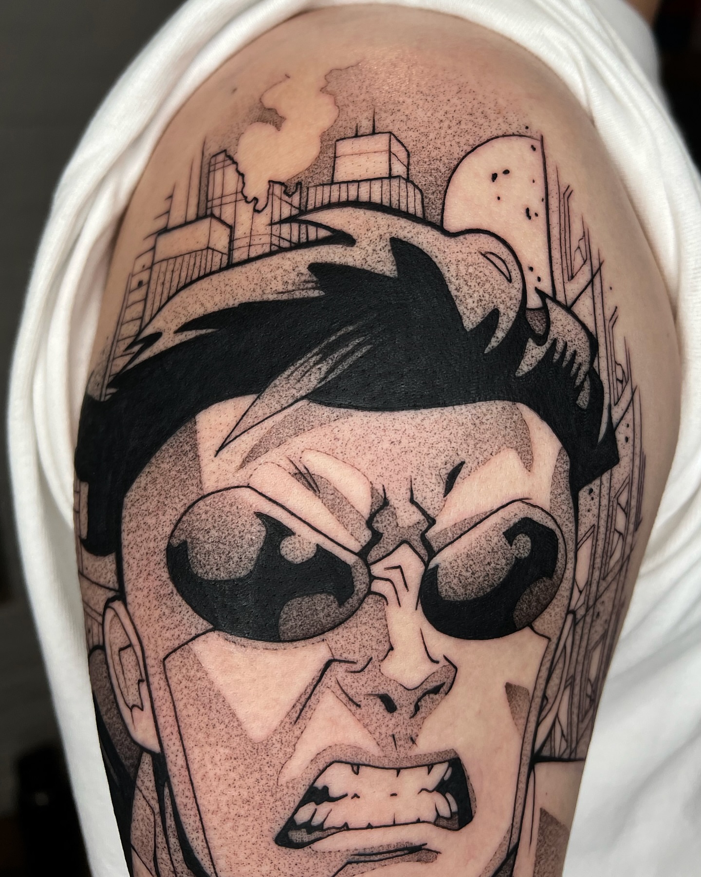 Angry man dotwork tattoo on the shoulder by Z, Greenville, South Carolina