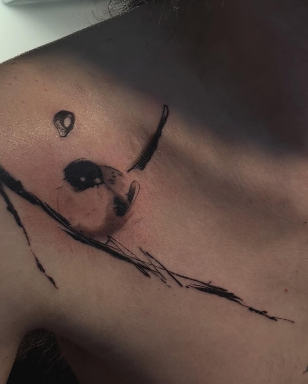 Bird on a branch sketch tattoo on the shoulder by Blight
