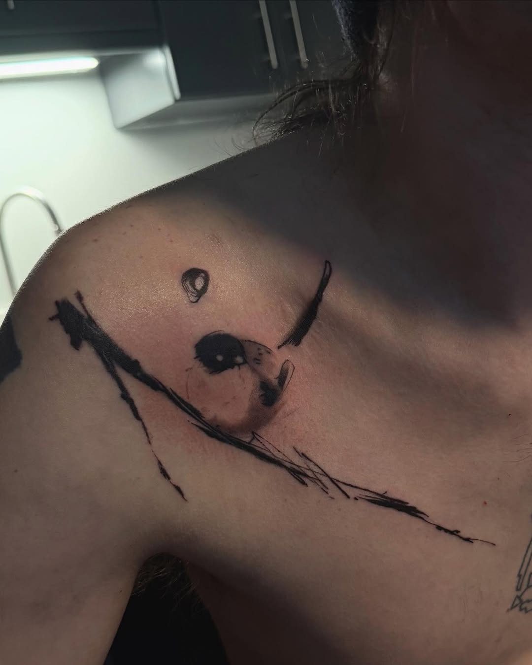 Abstract bird sketch tattoo on the shoulder by Blight