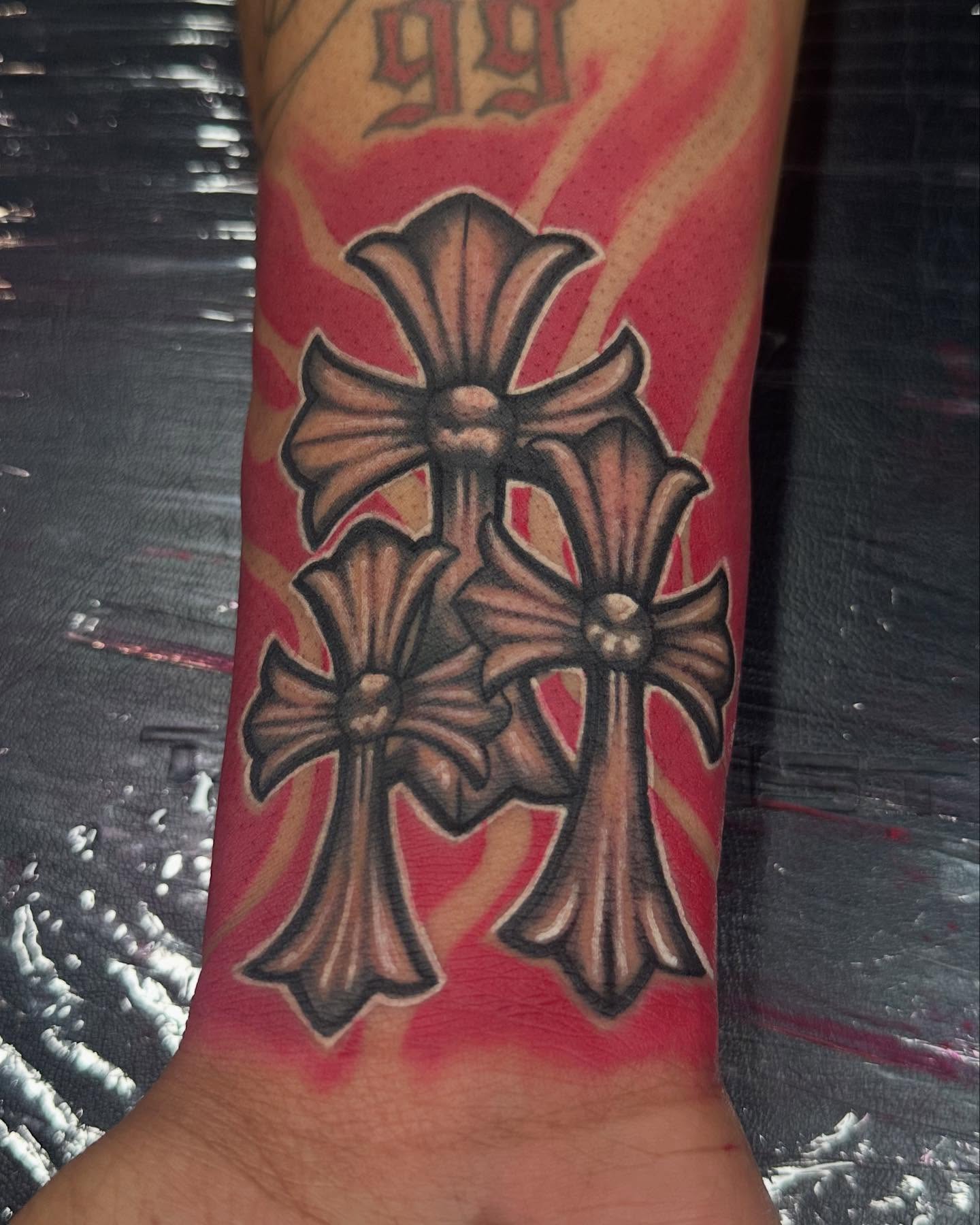 Crosses American traditional tattoo on the forearm by Svetlana