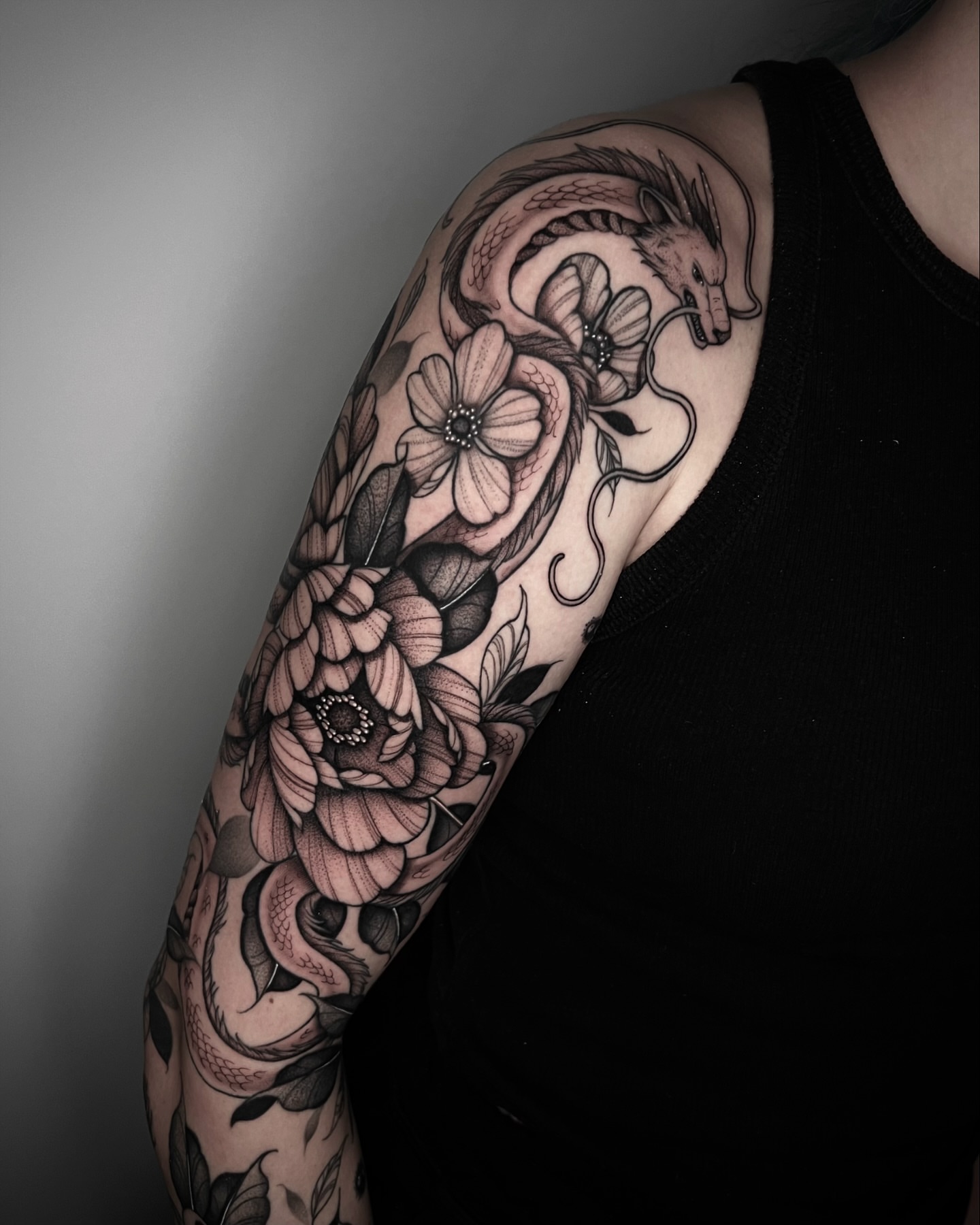 Dragon and flowers realism tattoo on the forearm by ๐ฒ๐ฐ๐ธ๐๐ป๐๐ฝ โก