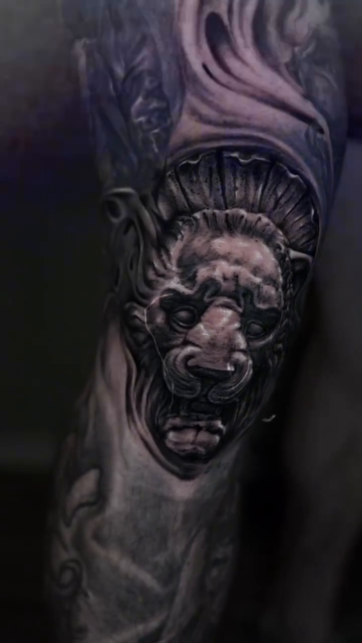 Lion head realism tattoo by Gregorio Devera