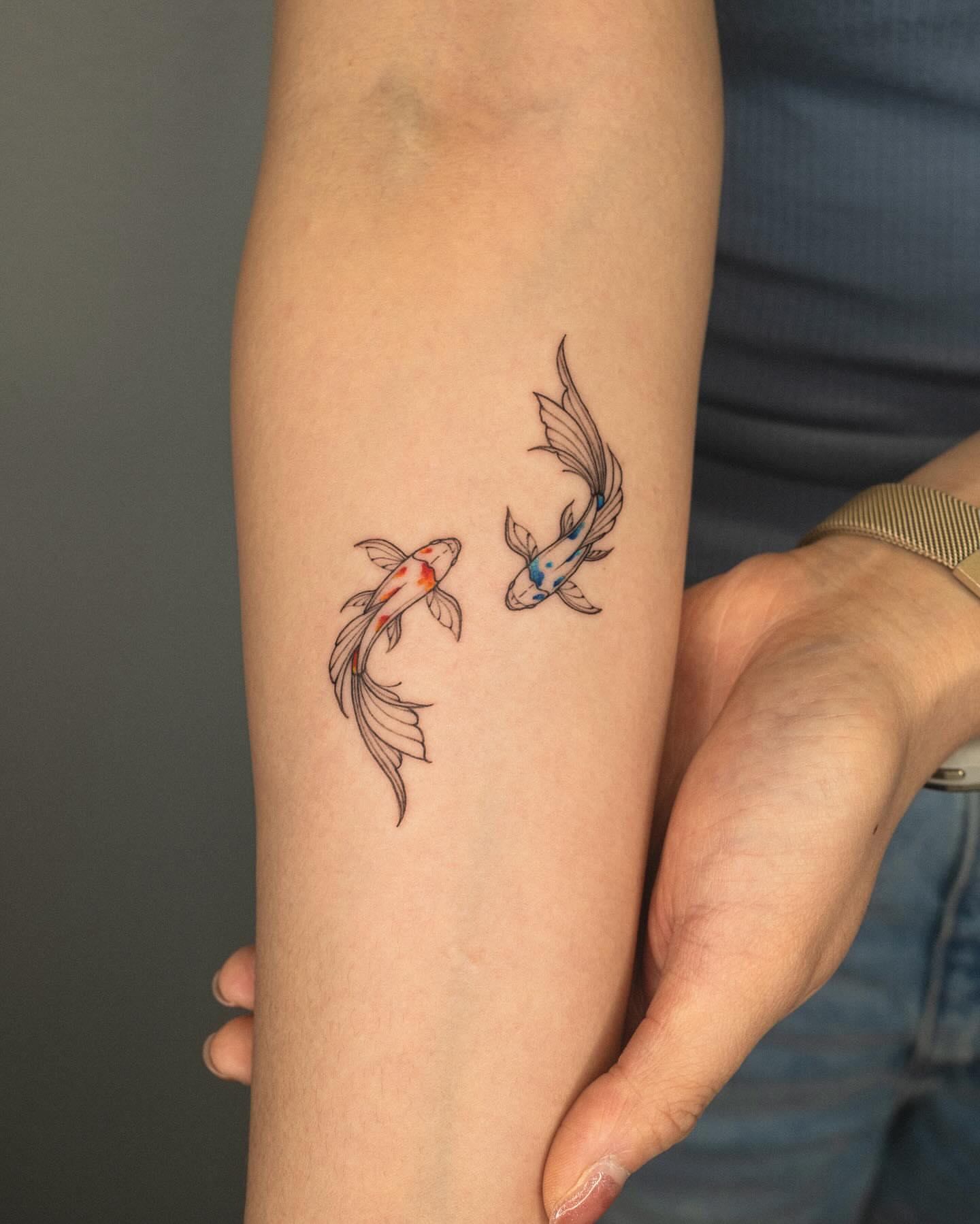 Koi fish dotwork tattoo on the forearm by ๐๐๐ฆ ๐๐ ๐ฎ๐ฒ๐๐ง