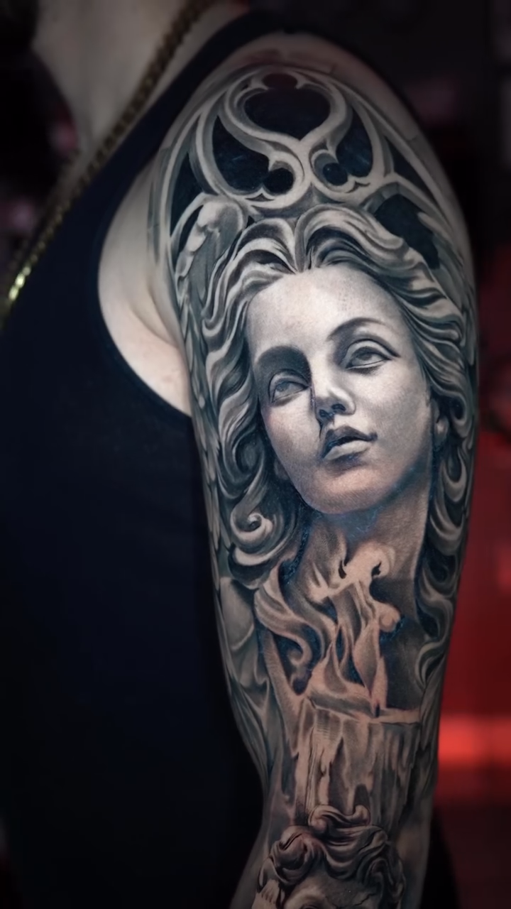 Cherubs and a woman realism tattoo by Andres García Baeza