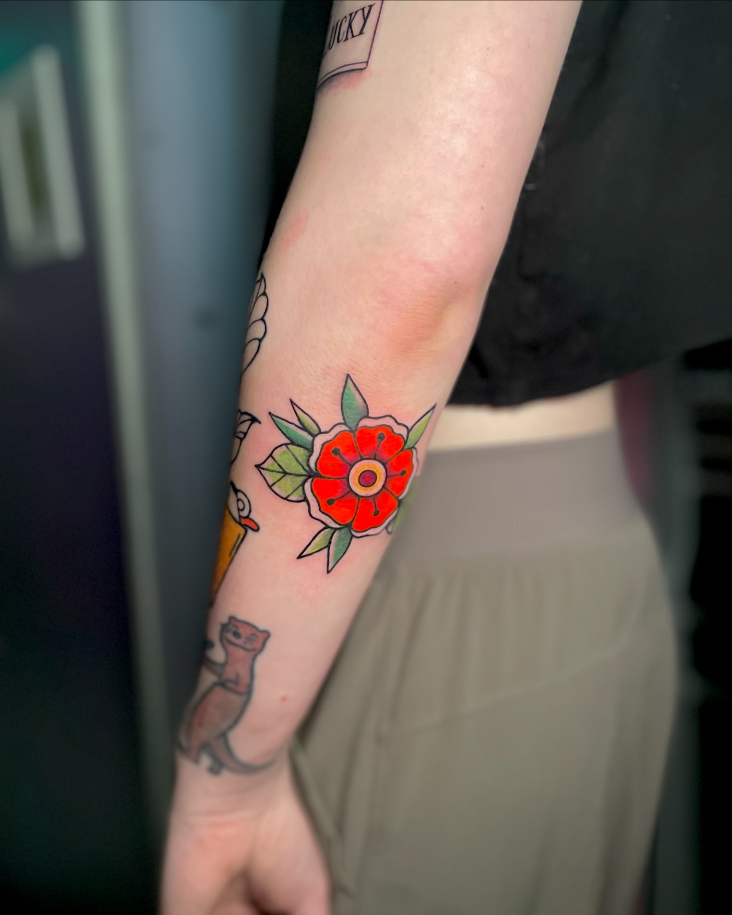 Flower American traditional tattoo on the forearm by Liv
