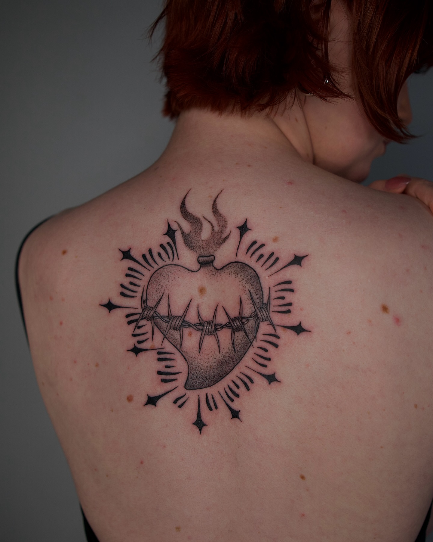 Heart with thorns black and grey tattoo on the back by šianca٠࣪ā