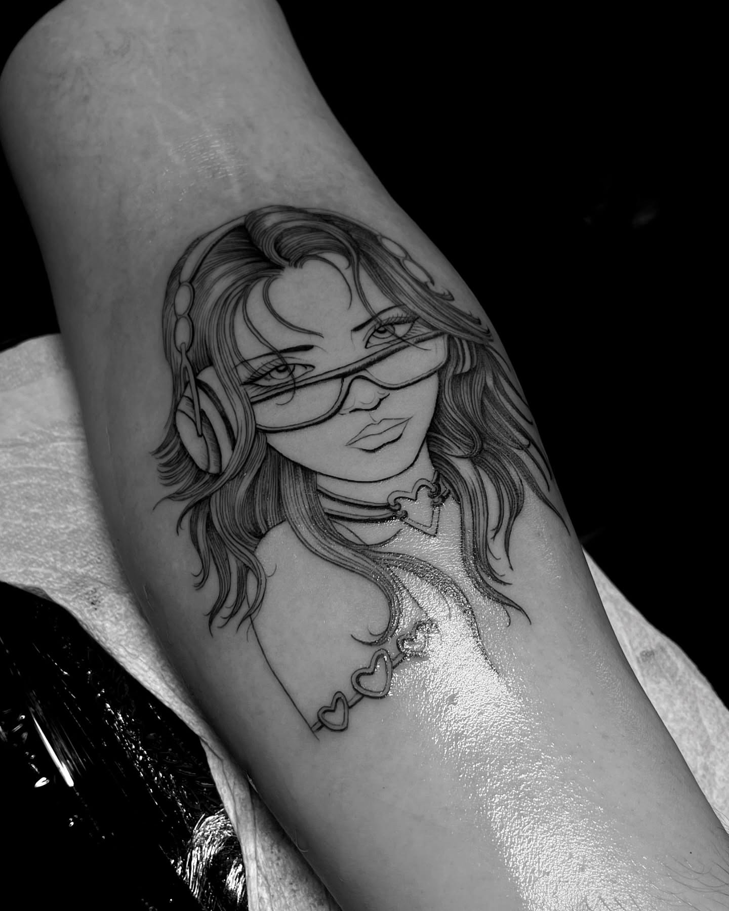 Woman with glasses realism tattoo on the forearm by Chriscalibur