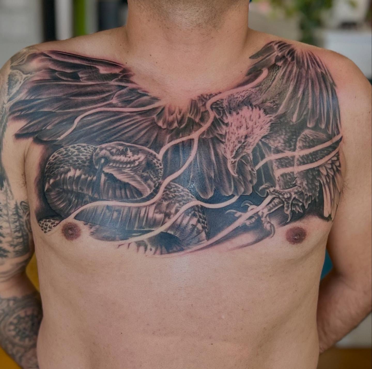 Tattoo by @jrtatt00 — black_and_grey, realism