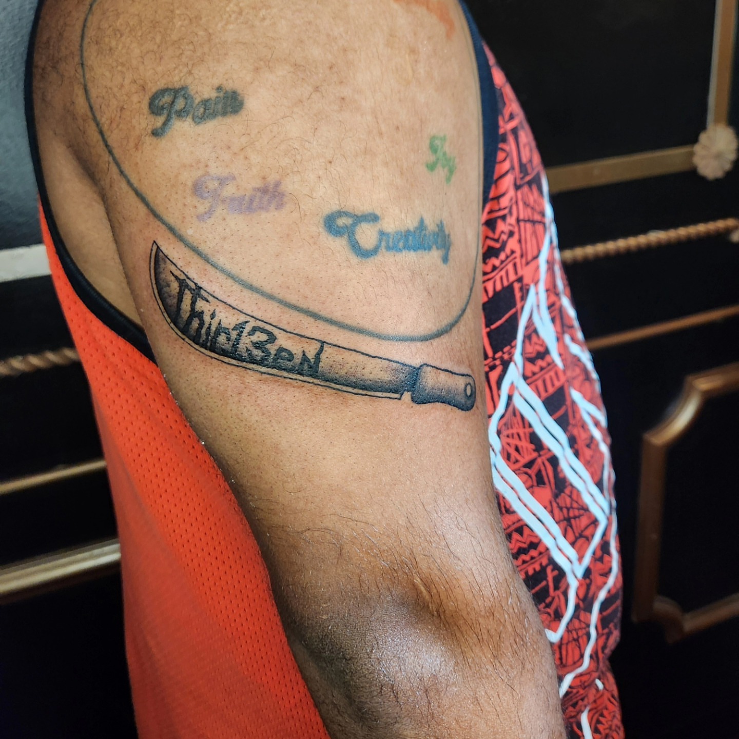 Knife lettering script tattoo on the forearm by Perry