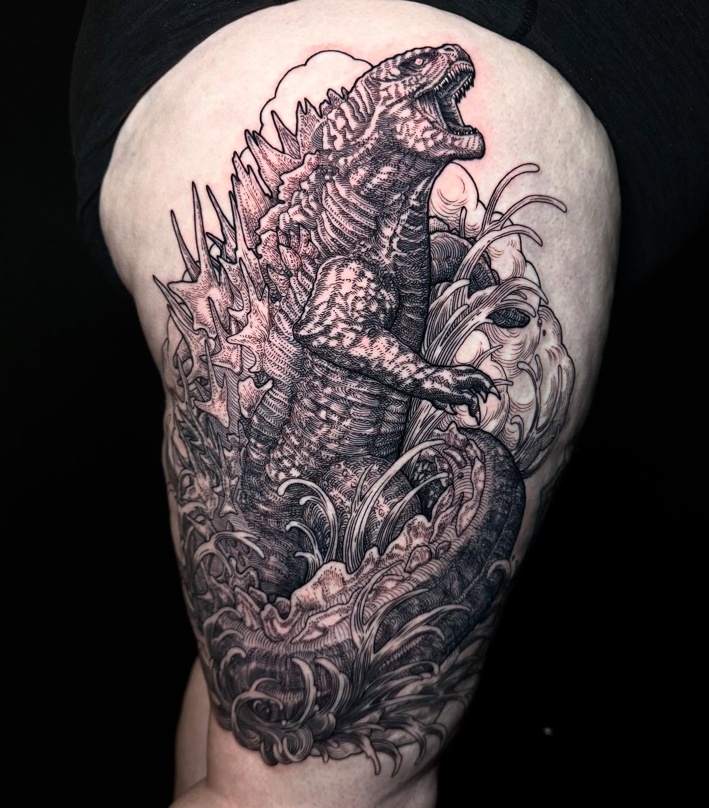 Godzilla realism tattoo on the thigh by Landon Morgan