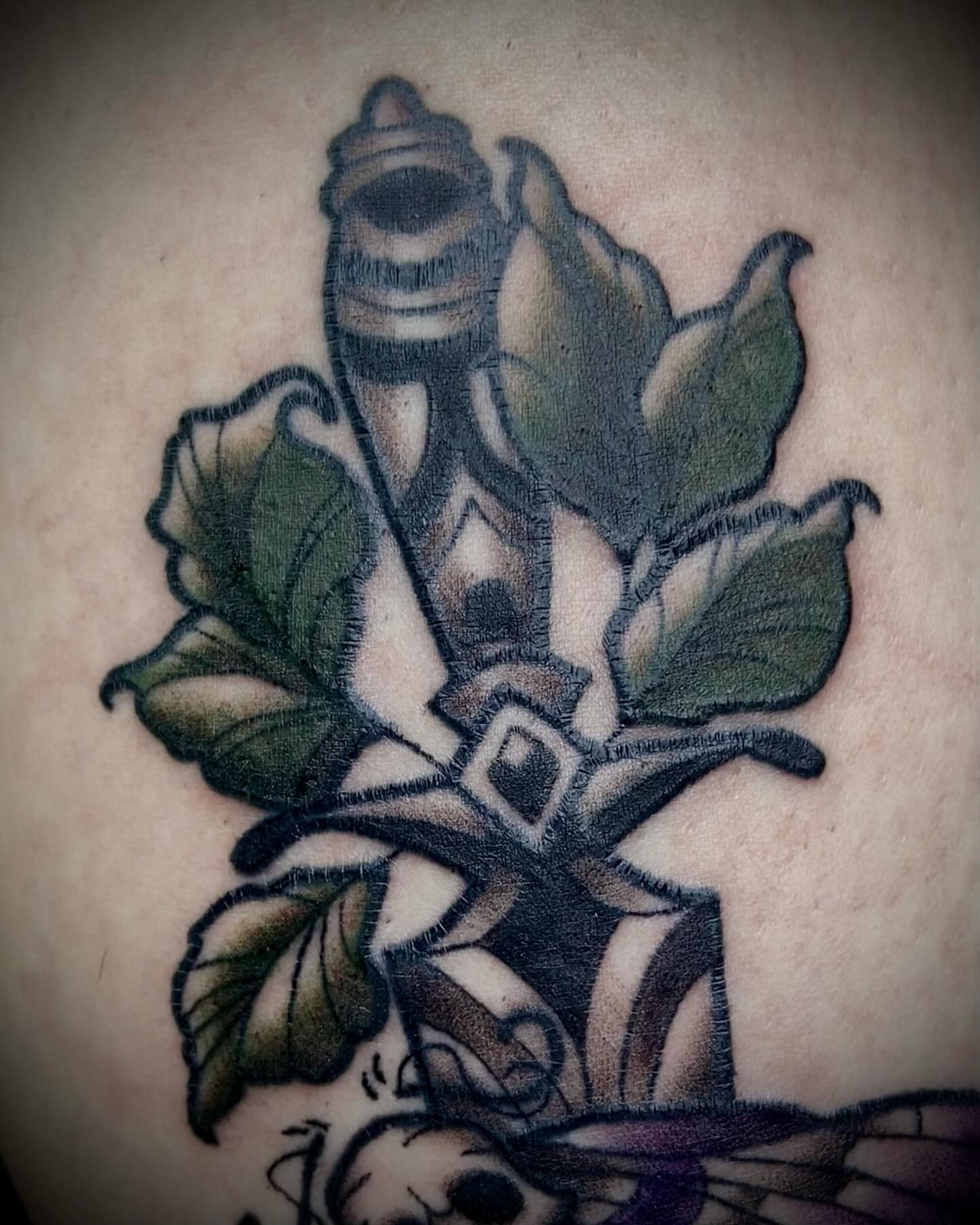 Sword and leaves American traditional tattoo on the torso by Shelbie, Salt Lake City, Utah