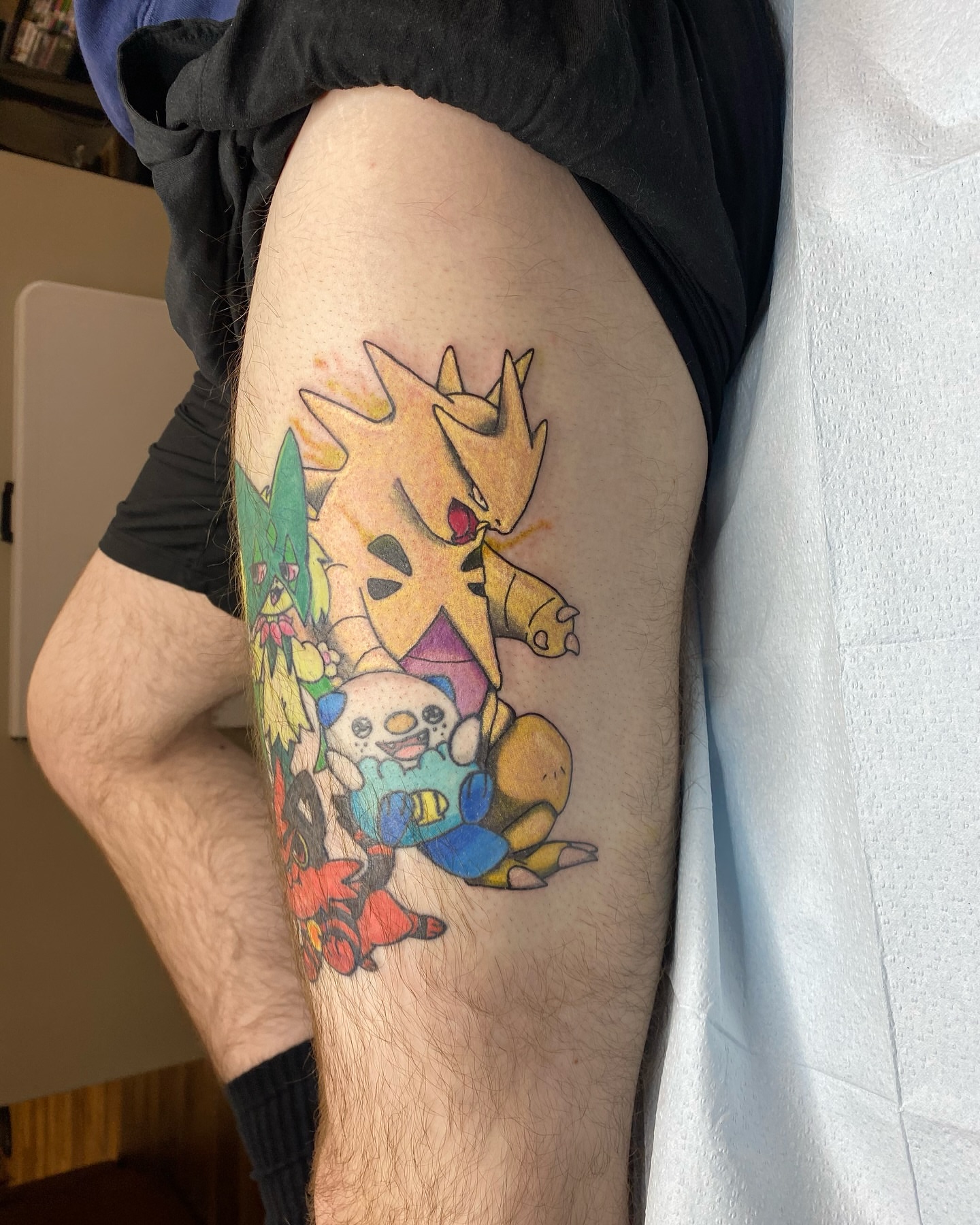 Pokémon characters new school tattoo on the thigh by Destinee DeFriece