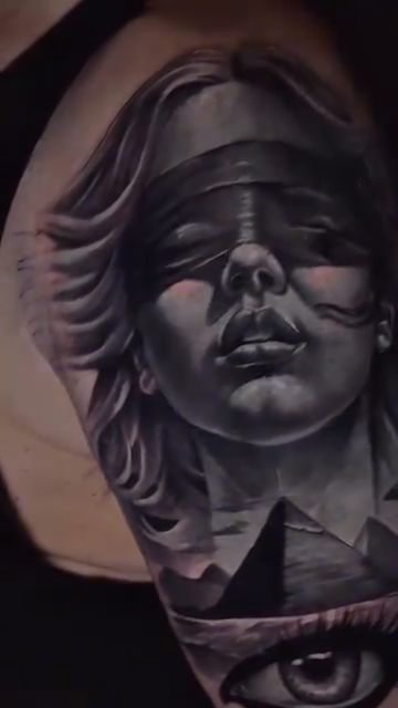 Blindfolded woman and eye of horus realism tattoo by Bailey Hancock