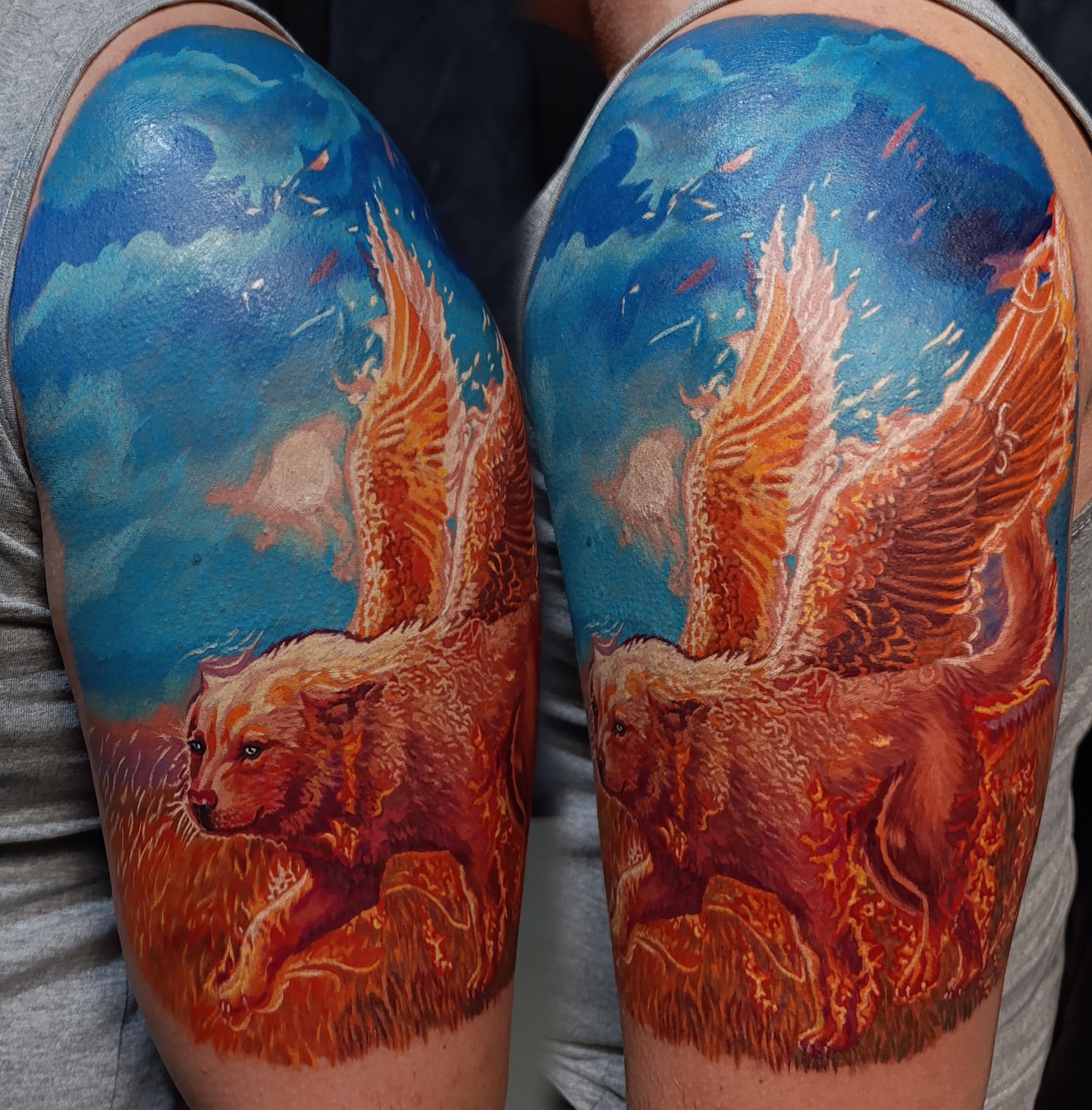 Winged wolves realism tattoo on the forearm by Vladimir Lutaev